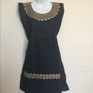 Denim like fabric. Hand embroidered dress